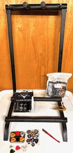 lot 83 image: Proline Guitar Stand, Fender Custom Shop Deluxe Guitar Care System, Twenty Great Guitar Picks, &amp Other Assesories&nbsp