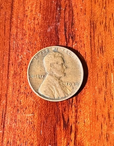 lot 131 image: 1940S Wheat Penny W L Rim Rolled Error