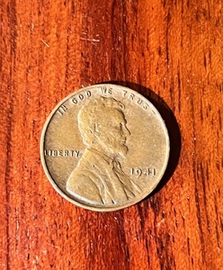 lot 132 image: 1941 No Mint Mark Wheat Penny W Rim Rolled L &amp Multiple Obverse Die Break Errors