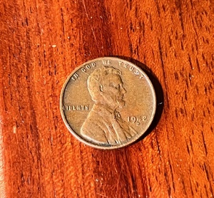lot 133 image: 1942 D Wheat Penny WRim Rolled L Error