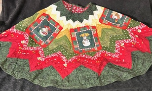 lot 234 image: Reversible Christmas Tree Skirt (Quilted Snowman to a Snowmans World) &amp Brightly Colored Penguin Santa (Please See All Pictures for Comparison)