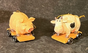 lot 227 image: Holstein Cow &amp Pig On Wheels Christmas Tree Ornaments