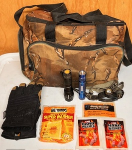 lot 198 image: Camo Bag, Body Guard Thinsulate Gloves, Hand Warmers, &amp Bell &amp Howell and Maglite Flashlights W Headlamp