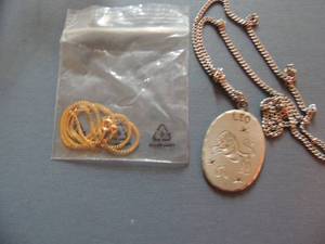 lot 521 image: Goldstone chain  and Pewter Leo necklace