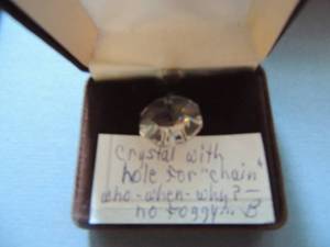lot 526 image: Crystal with hole for chain and multicolored jewlery bag