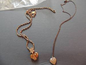 lot 551 image: necklaces x2 hearts on chains