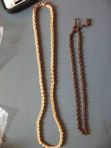 lot 555 image: 2 necklaces- brass chain and 30 inch gold and seed pearl