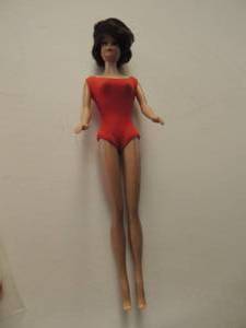 lot 586 image: VINTAGE BUBBLE CUT BARBIE BRUNETTE WITH ORIGINAL RED SWIMSUIT 1962 JAPAN