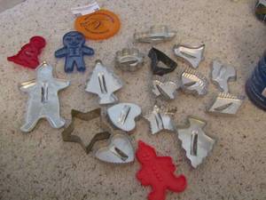 lot 38 image: Aluminum   & Plastic cookie cutters - . Gingerbread man, Santa, diamonds, hearts