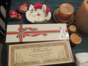 lot 45 image: WILLIAMSBURG BEESWAX  CANDLES, Santa and elf candle stick holder, 3 wick candle used, various other candles