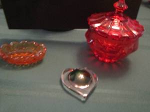 lot 97 image: red covered candy bowl, small orange tray, heart trinket