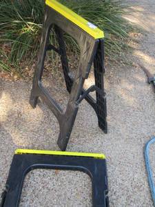 lot 164 image: 2 HARD PLASTIC SAW HORSES