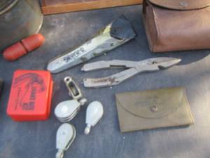 lot 182 image: snake bite kit, plyers, PULLEYS, SMALL COVERED TRASHCAN, EATING UTENSILS  and more