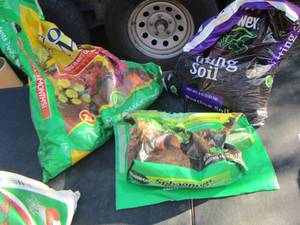 lot 190 image: used bags of plotting soil