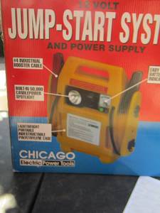 lot 225 image: 12 volt jump-start system and power supply