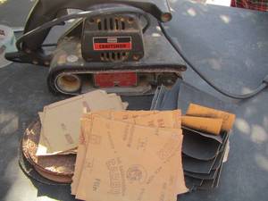 lot 234 image: craftsman sander electric and sanding paper
