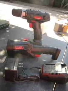 lot 244 image: drill master battery charger, flashlight and drill comes with battery