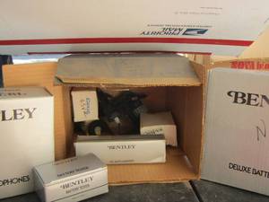 lot 266 image: Bentley stereo headphones, battery tester, dc auto adapter, deluxe battery charger