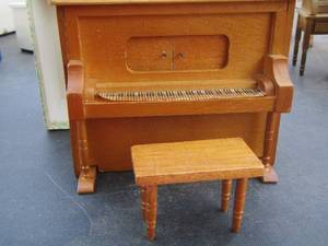 lot 286 image: doll house piano musical