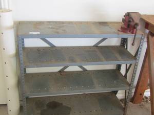 lot 400 image: 4 tier metal work shelf with champion vice attached