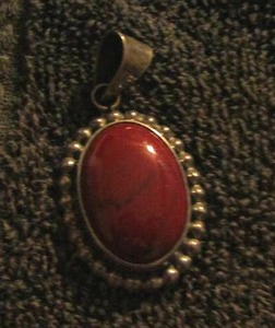 lot 41 image: necklace pendant dark red color