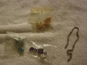 lot 56 image: bracelet, charms, turquoise earrings