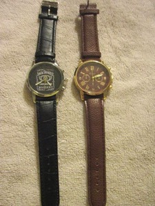 lot 62 image: 2 watches one is Jack Daniels Whiskey