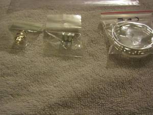 lot 70 image: TWO EAR CUFFS & hoop earrings