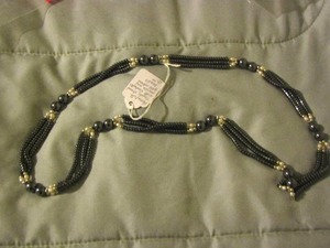 lot 134 image: Hematite triple strand with freshwater pearls and gold colored beads