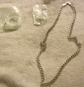 lot 82 image: qty 3 types of silver necklaces