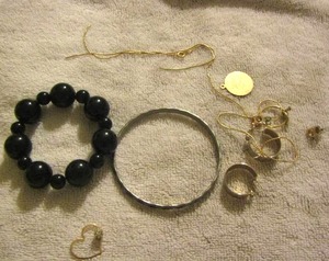 lot 83 image: silver bracelet, pair of earrings, heart necklace pendant, and more