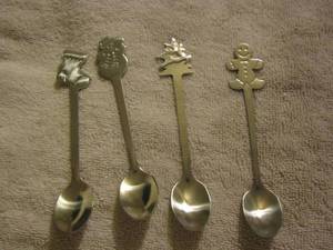 lot 87 image: Christmas design spoons qty 4 snowman, stocking, tree, ginger bread man