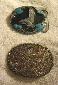 lot 95 image: Turquoise belt buckle Siskiyou H-7 brand  & Silver belt buckle