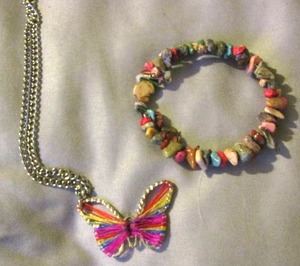 lot 154 image: Butterfly chain necklace- rock braclet