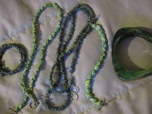 lot 155 image: green and grey rock beaded necklaces with matching bracelets and a green triangle braclet