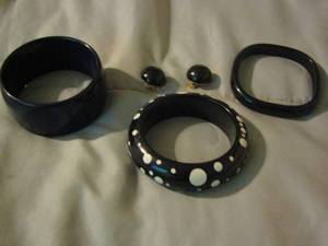 lot 163 image: qty 3 black wooden bracelets and one pair of black earrings