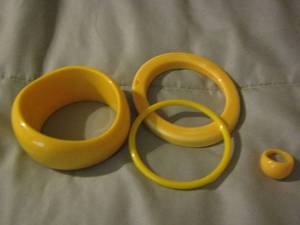 lot 165 image: 3 yellow womens bracelets and one yellow ring