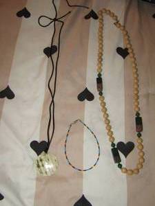 lot 189 image: beaded bracelet- wooden beaded necklace,  black corded necklace w green shell disc