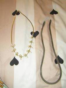 lot 209 image: gold pearl necklace- silver chain
