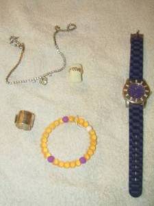 lot 233 image: purple watch- elephant ring- 2 bracelets