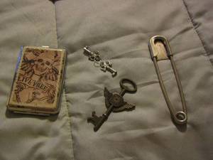 lot 269 image: key large safety pin, skull cigarette pouch