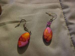 lot 272 image: pink and purple earrings, black and white beaded necklace, cupid watch
