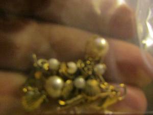 lot 316 image: various earrings and bracelets in a bag