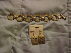 lot 339 image: loop bracelet, pair of face earrings