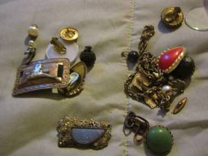 lot 335 image: Cow belt buckle, earrings clip on and more