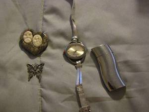 lot 278 image: Zippo lighter, Julius womens watch, butterfly necklace pendant, heart shape rock shirt pin