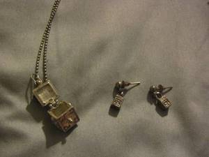 lot 394 image: Jack in the Box necklace with matching earrings