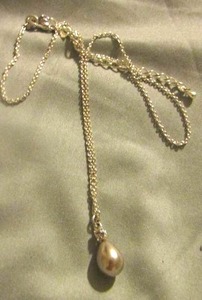 lot 23 image: DROP pendant and silver necklace