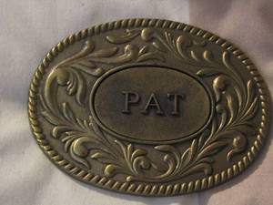 lot 205 image: The Kenny co. 1977 pat belt buckle-  Malt Liquor Louis Chicago belt buckle