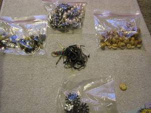 lot 248 image: various bags of beads and beaded bracelets